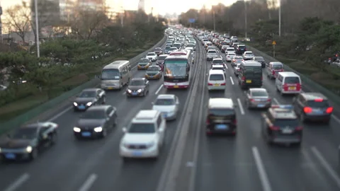 Slow Traffic Flow with Tilt Shift Lens At Sunset Stock Footage 136035279