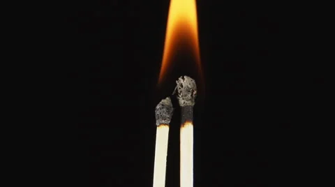 SLOW: Two flaming matches Vídeo Stock 63897006