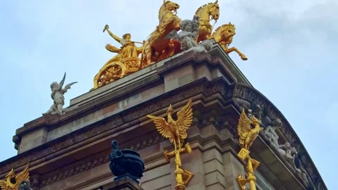 Slow upward camera reveal captures gilded Quadriga de l'Aurora chariot Video stock 331955592