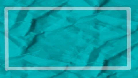 Slow vertical panning motion of wrinkled paper, solid teal blue green color.. Stock Footage 321966708