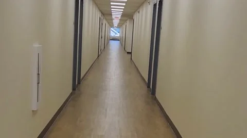 Slow Walk Down Hallway Stock Footage 224705723