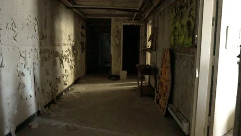 Slow Walk Through a Creepy Hallway in an Abandoned Building Stock Footage