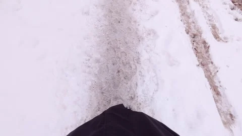 Slow walk through snow first person perspective Stock Footage 324338940