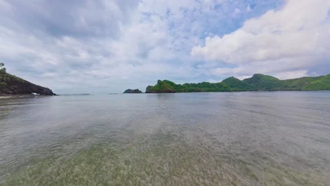 Slow Walking Shot Across Clear Turquoise Sea Vidéo 336178419