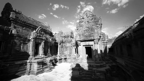 Slow whip pan across the many ruins of Banteay Srei temple in Angkor Wat Stock Footage 83518912