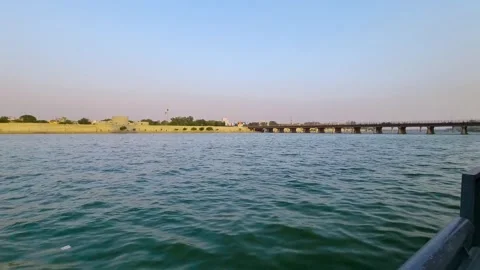 Slow wide angle locked shot of the bridge and Sabarmati river in Ahmedabad at Stock Footage 274405556