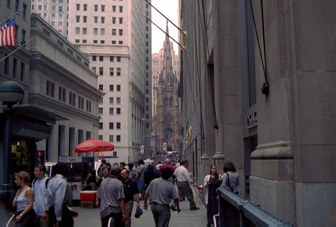 Slow zoom into crowds walking on Wall Street in New York City Stock Footage 86914232