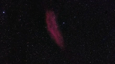 Slow zoom-in on a deep red nebula in outer space Stock Footage 120289360