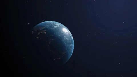 Slow zoom in on the Earths globe rotating in space. Day and night are Stock Footage