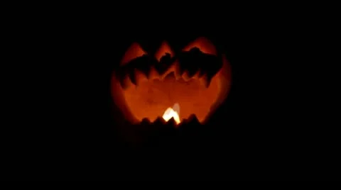 Slow Zoom in on Halloween Burning Pumpkin jack o lantern  Stock Footage 13420106