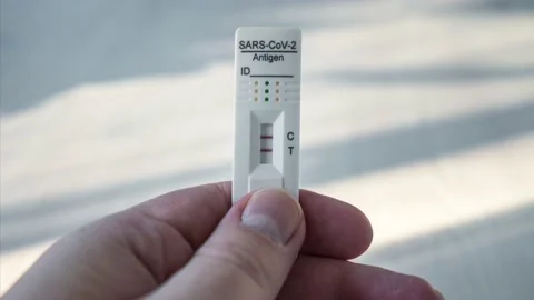 Slow zoom into sars cov 2 antigen testing card. Covid 19 pandemic theme. Stock Footage 170629660