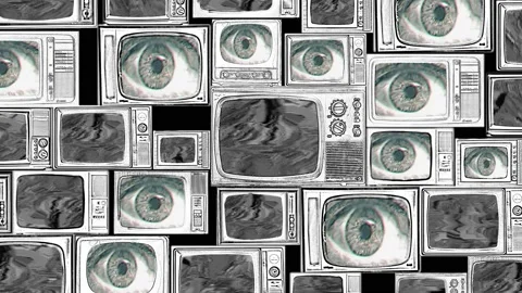 Slow zoom in the wall of several televisions with a static signal gradually r Video stock 130664600