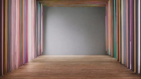 A slow zooming effect from a horizontal frame on a gray wall around a decor.. Stock Footage 273954603