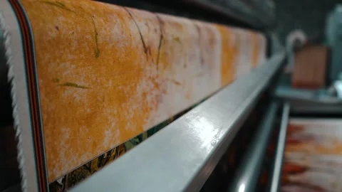 Slow zoomout of material entering printer Stock Footage 135160830