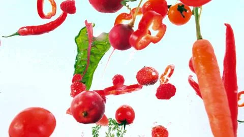 Slower fall of red-colored bricks Stock Photos