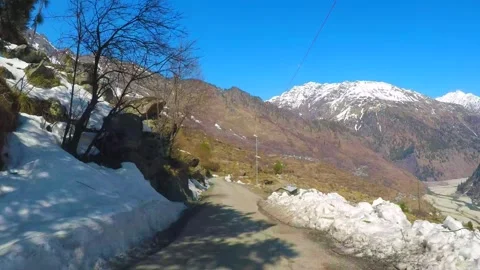 Slowing down on snow and ice-covered Mountain Video stock 220697736