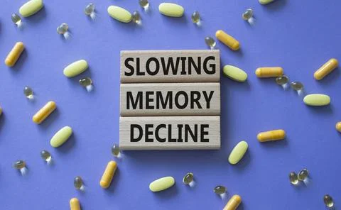 Slowing Memory Decline symbol. Concept words Slowing Memory Decline on wood.. Stock Photos