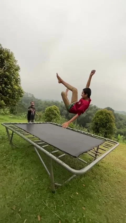 Slowing Motion on a trampoline 動画素材 244140126