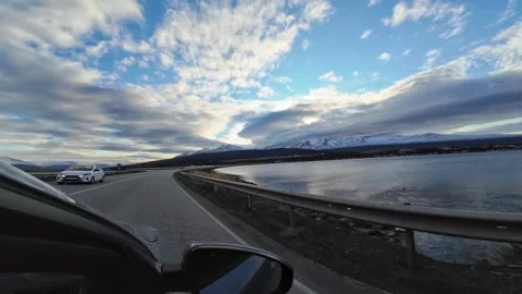 Slowly Advancing Along a Waterside Road in Iceland Stock Footage 342270409