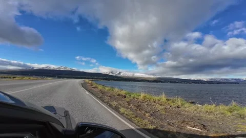 Slowly Advancing Along a Waterside Road in Iceland Stock Footage 342270448