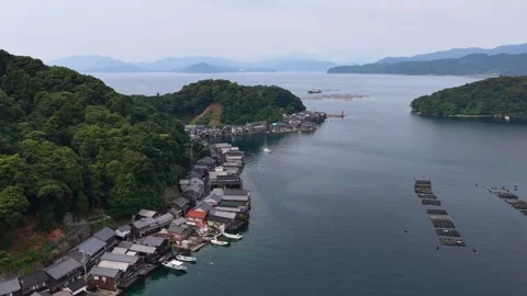 Slowly Advancing Drone View of Ine Funaya Boathouses Stock Footage 342256803