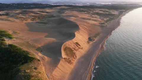 Slowly Advancing Drone View of Tottori Sand Dunes Coast Stock Footage 342256483