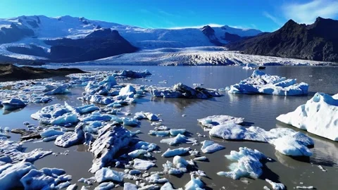 Slowly Advancing Over Ice Floes at Fjallsárlón Glacier Lagoon Stock Footage 342267988