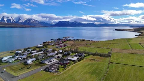 Slowly Advancing Over an Icelandic Lakeside Settlement Stock Footage 342270622