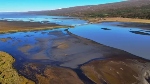 Slowly Advancing Over Shallow Icelandic Wetlands Stock Footage 342269151