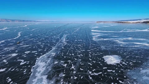 Slowly Advancing Over Transparent Ice on Lake Baikal, Russia Video stock 342235599