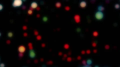 Slowly Bokeh Colored Particles Backgorund Loop Stock Footage 63456639
