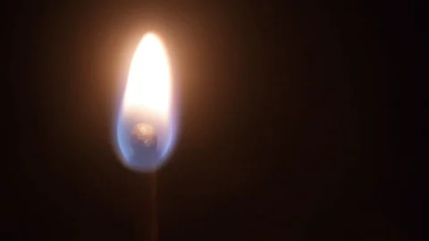Slowly burning match in the dark Stock Footage 124293683