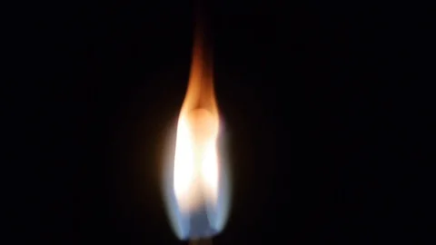 Slowly burning match in the dark Stock Footage 124294091