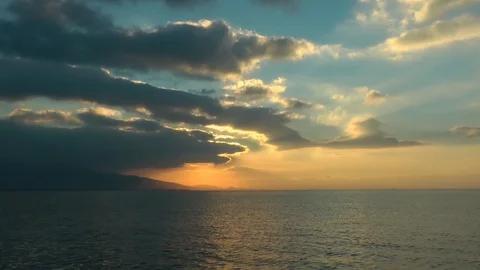 Slowly Clean Clouds and Yellow Sunset Time Lapse Stock Footage 98958902