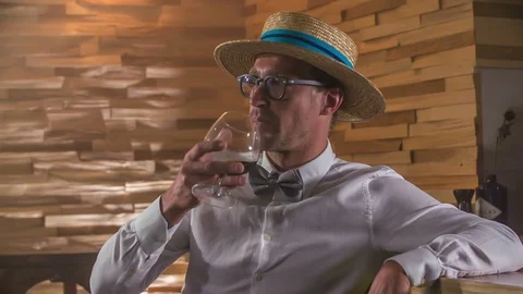 Slowly drinking some whisky and watching the band performing Stock Footage 112200304