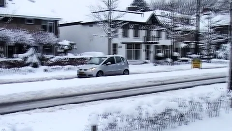Slowly driving in the snow. Stock Footage 83829259