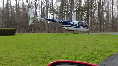 Slowly Driving Towards Private Helicopter On Helipad Stock Footage 246976341