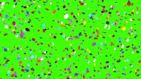 Slowly Falling Round Confetti on a Green Background Stock Footage