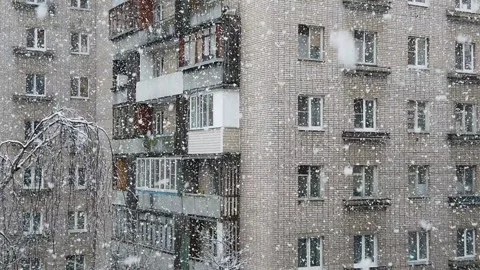Slowly falling snow in the old town in winter Stock Footage 151518330