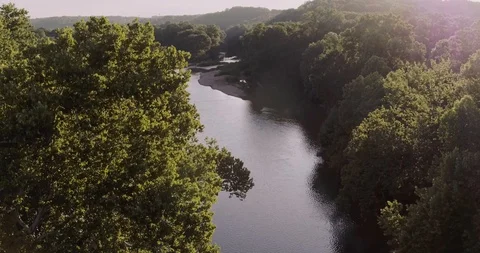 Slowly flowing down river Stock Footage 90766328