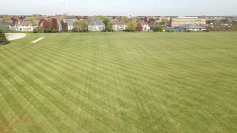 Slowly flying over of various school or community fields Stock Footage 142489549