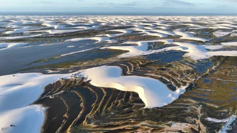 Slowly Gliding Over Dark Water Ribbons and White Sandbars in Lençóis Maranhenses Stock Footage 342444897