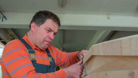 Slowly grinding the surface of the wooden car Stock Footage