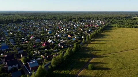 Slowly lifting up the drone over russian countryside. Aerial shot of Real Estate Stock Footage 161260018