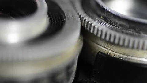 Slowly moving aperture ring on an old 35 mm vintage camera Stock Footage 136111527