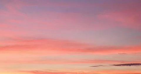 Slowly moving beautiful pinky clouds in sky during sunset Red purple orange b Stock Footage 159402695