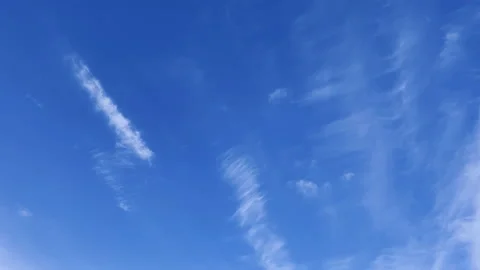 Slowly moving snow-white clouds in the blue sky Stock Footage 151287065