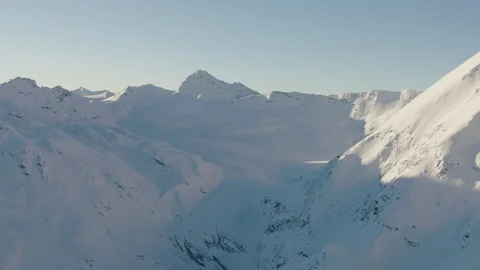 Slowly moving towards a massive mountain face Stock Footage 101911016