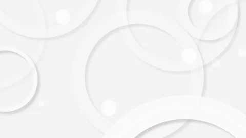 Slowly moving white circles with soft shadows on pastel grey backdrop. Seamless Stock Footage 269372434
