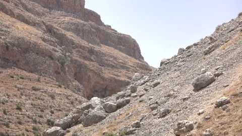Slowly Panning Down Slopes of Mountainside in Israel Stock Footage 78310090